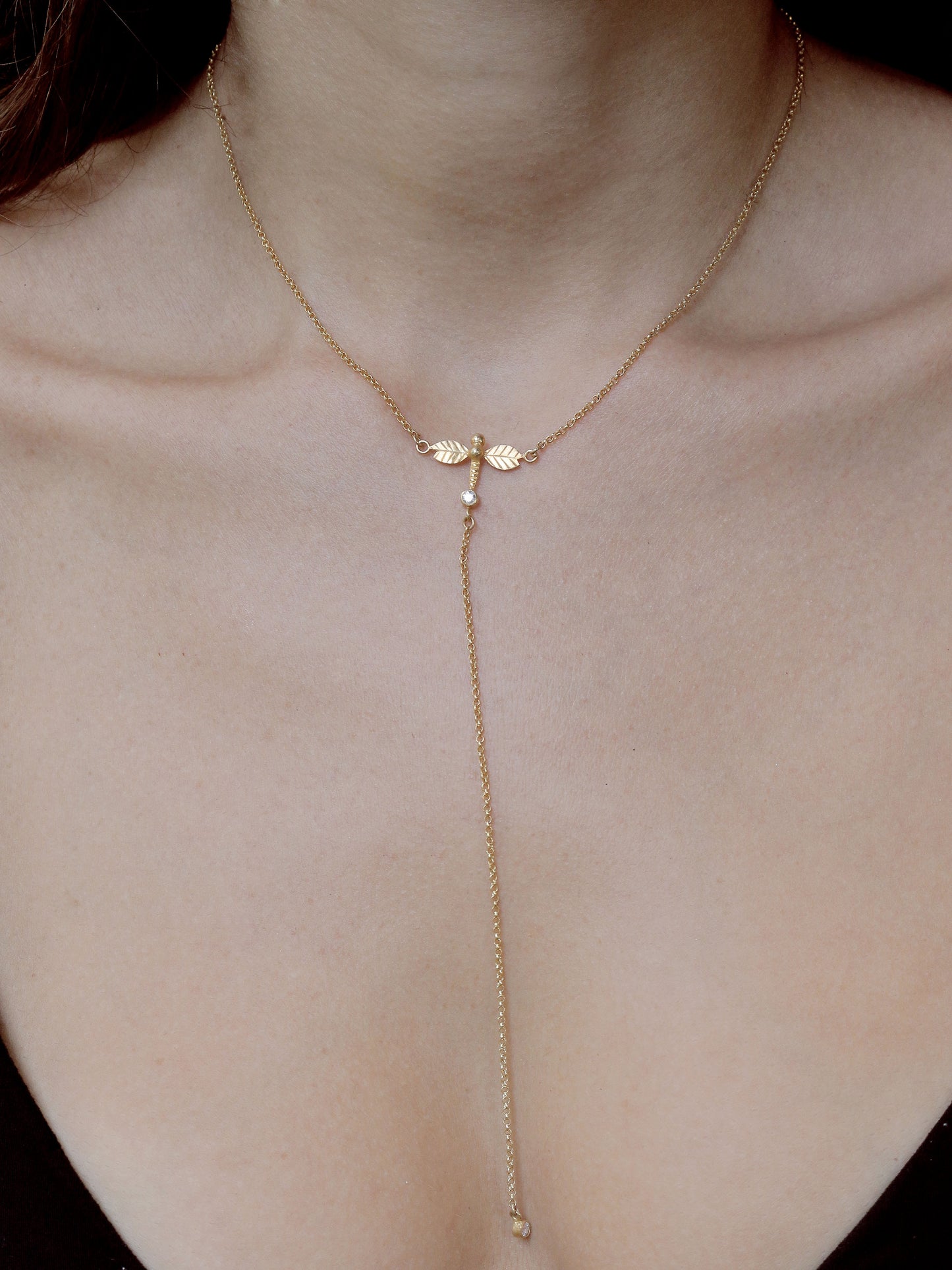dragonfly drop necklace on model