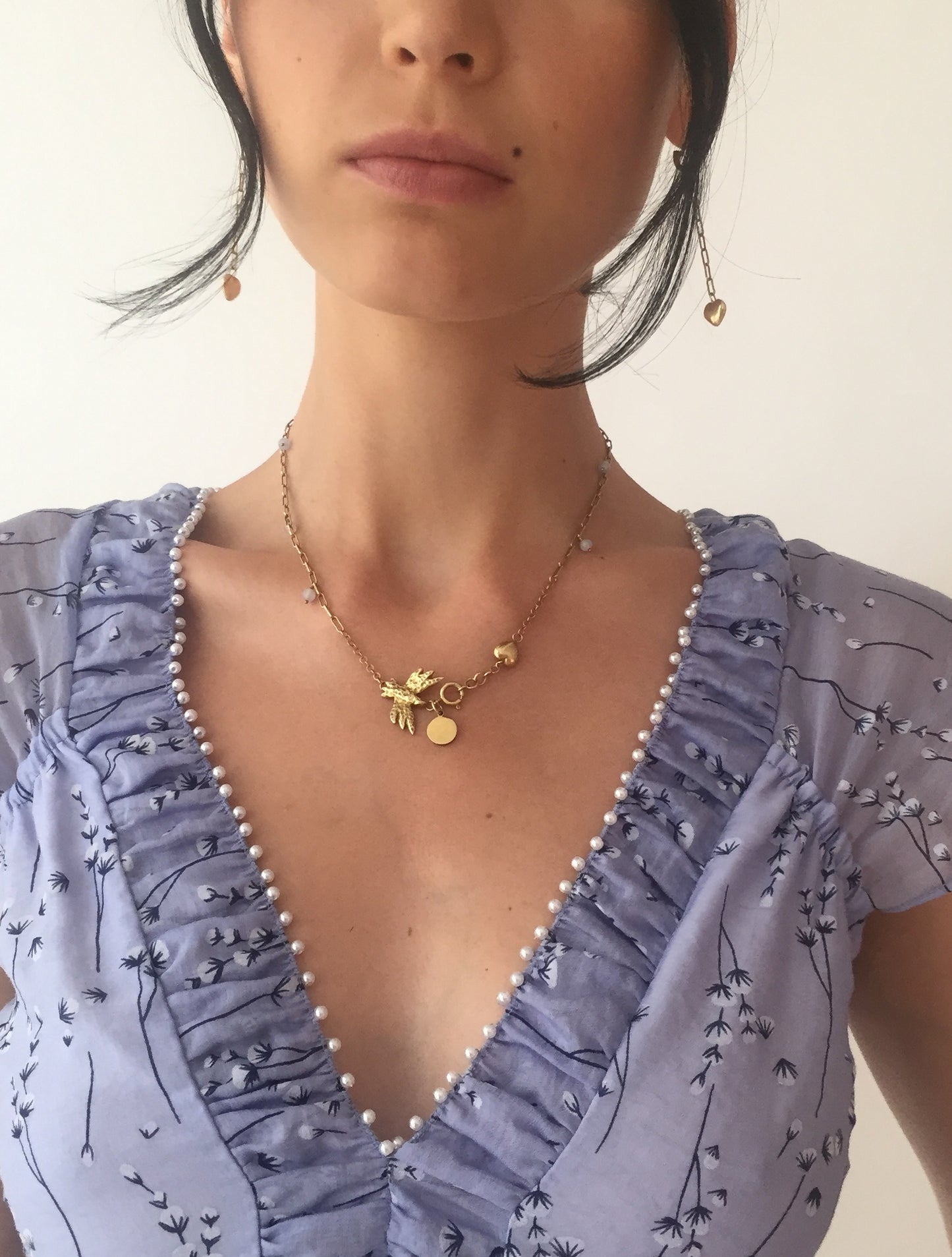 Gold Heart Mini Circle Earrings on model