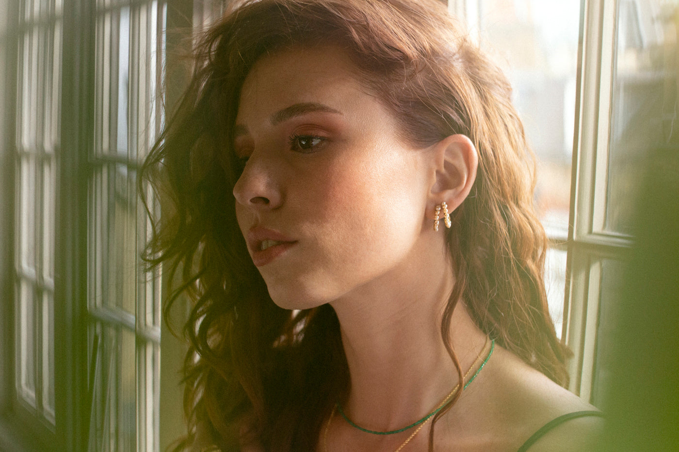gold hoops Earrings with pearls on model