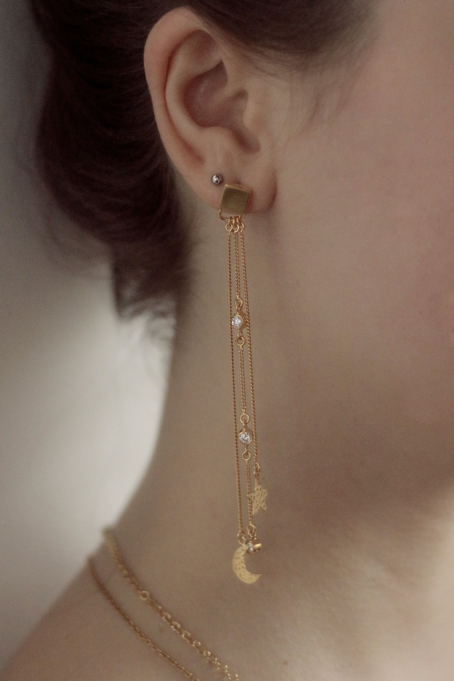 Gold Sky Chain Earrings on model