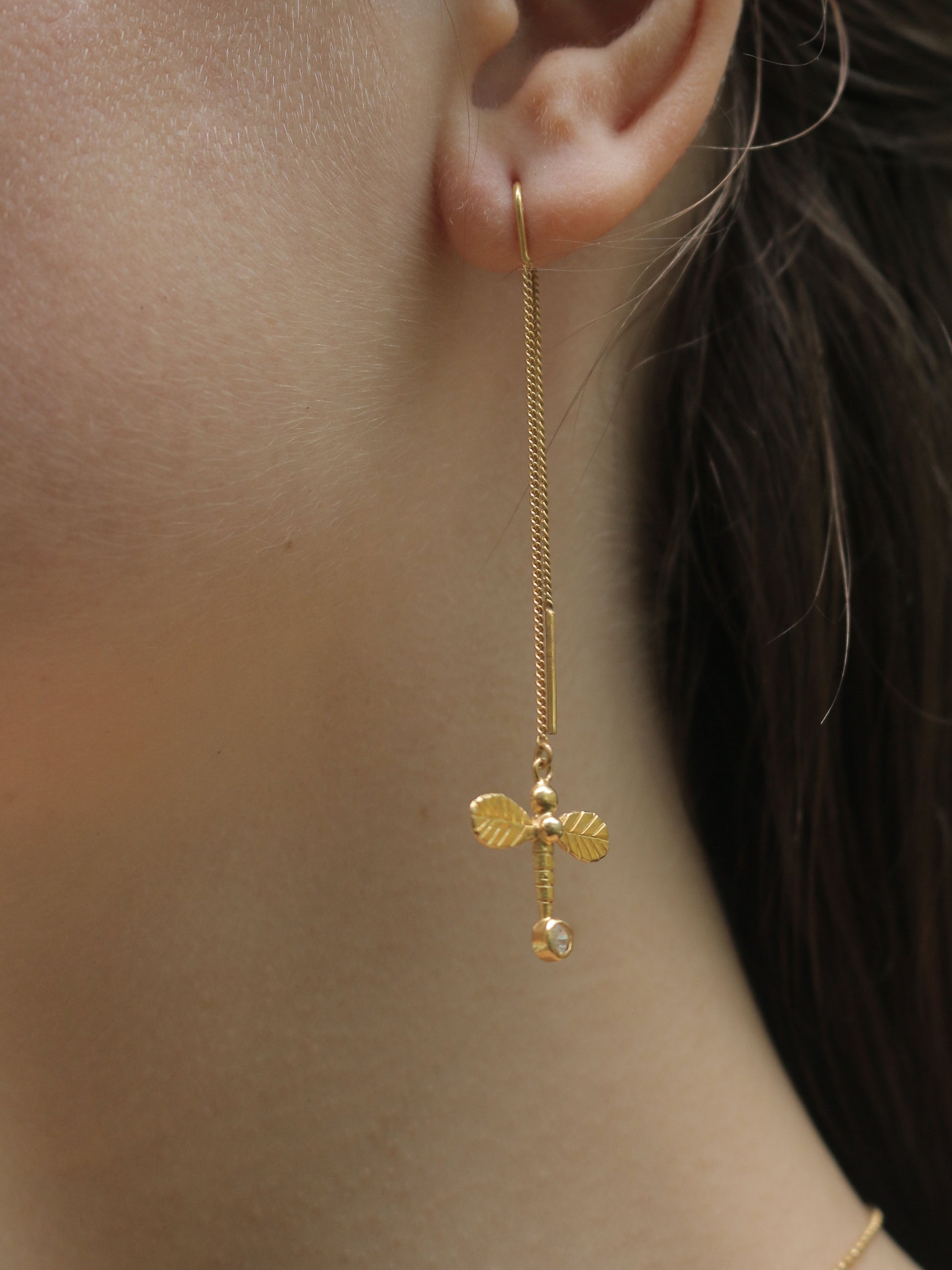 Dragonfly earrings on model