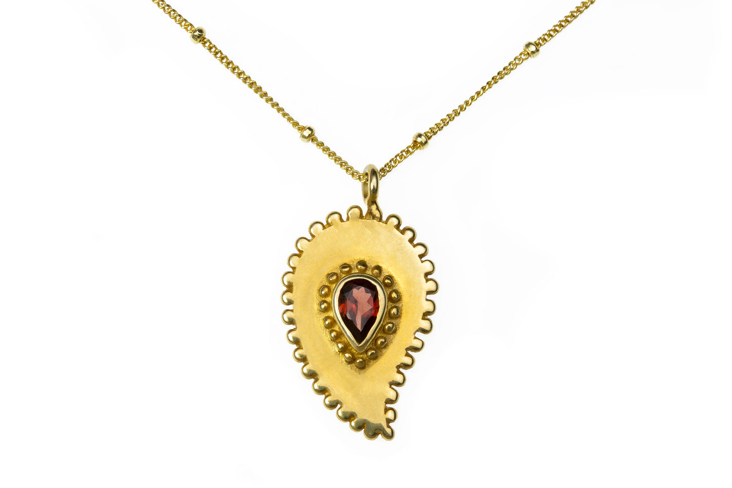 Love drop Garnet gold necklace close up