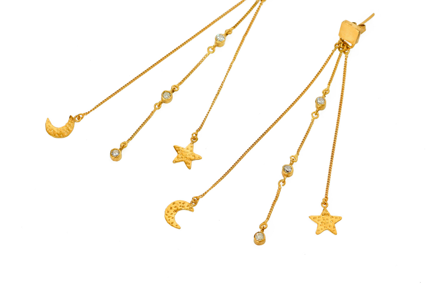 chain earrings stars and moons close up