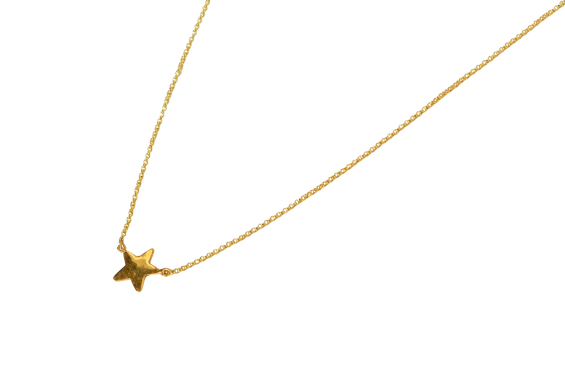 Gold star necklace close up details